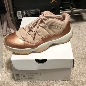 Women’s low top heiress Jordan 11s rose gold
